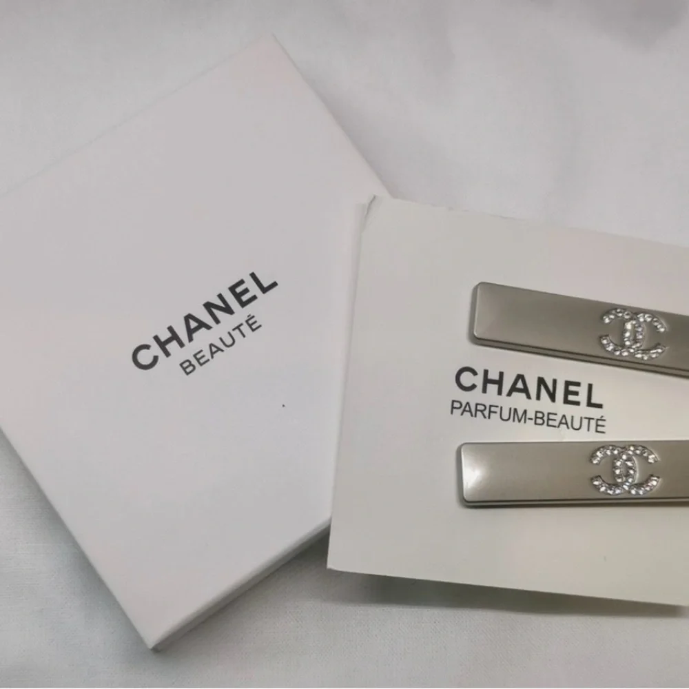 CHANEL Silver Hair Clips with Crystal Logo - Picture 7 of 9